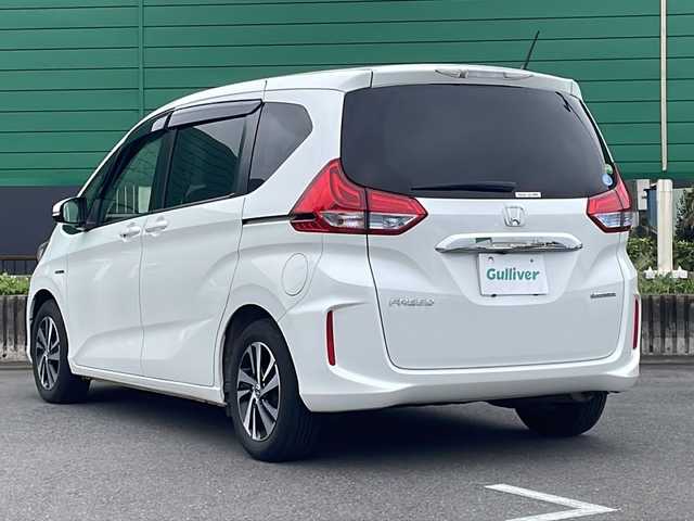ホンダ フリード ハイブリット G ホンダセンシング 茨城県 2017(平29)年 7.1万km ホワイトオーキッドパール ワンオーナー/純正SDナビ/バックカメラ/Bluetooth接続/ビルトインETC/横滑り防止装置/レーンキープアシスト/衝突軽減システム/オートライト/LEDヘッドライト/両側パワースライドドア/ハーフレザー/純正フロアマット/純正15インチアルミホイール/ウォークスルー/保証書/取扱説明書/記録簿