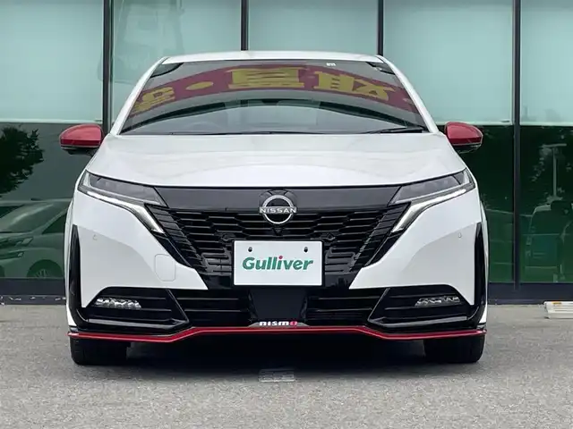 日産 オーラ ニスモ 和歌山県 2022(令4)年 1.1万km ピュアホワイトパール 純正メーカーナビ/アラウンドビューモニター/HDMI/エマージェンシーブレーキ/プロパイロット/デジタルインナーミラー/ビルトインETC2.0/置くだけ充電/シートヒーター/ステアリングヒーター/純正フロアマット/純正アルミホイール/LEDヘッドライト/オートライト/オートマチックハイビーム