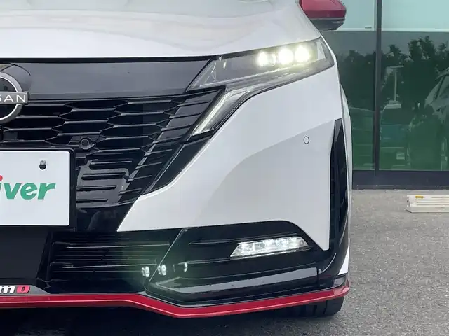 日産 オーラ ニスモ 和歌山県 2022(令4)年 1.1万km ピュアホワイトパール 純正メーカーナビ/アラウンドビューモニター/HDMI/エマージェンシーブレーキ/プロパイロット/デジタルインナーミラー/ビルトインETC2.0/置くだけ充電/シートヒーター/ステアリングヒーター/純正フロアマット/純正アルミホイール/LEDヘッドライト/オートライト/オートマチックハイビーム