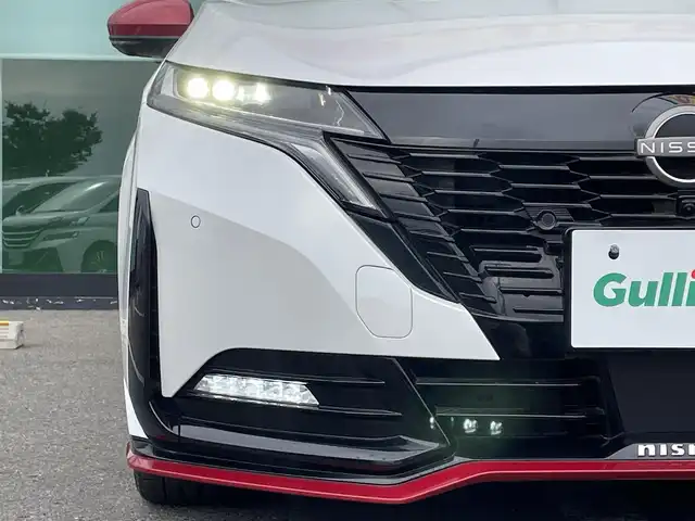 日産 オーラ ニスモ 和歌山県 2022(令4)年 1.1万km ピュアホワイトパール 純正メーカーナビ/アラウンドビューモニター/HDMI/エマージェンシーブレーキ/プロパイロット/デジタルインナーミラー/ビルトインETC2.0/置くだけ充電/シートヒーター/ステアリングヒーター/純正フロアマット/純正アルミホイール/LEDヘッドライト/オートライト/オートマチックハイビーム