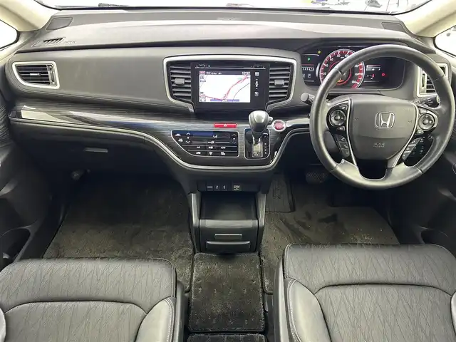 ホンダ オデッセイ アブソルート アドバンス 大阪府 2016(平28)年 7万km クリスタルブラックパール Honda SENSING/・衝突軽減ブレーキ/・歩行者事故低減ステアリング/・アダプティブクルーズコントロール/・車線維持支援システム/・路外逸脱抑制機能/・誤発進抑制機能/・先行車発進告知機能/純正ナビ/　CD/DVD/BT/フルセグTV/マルチビューカメラシステム/フロント・サイド・バックカメラ/両側パワースライドドア/オートLEDヘッドライト/フォグランプ/ハーフレザーシート/D席パワーシート/純正17インチアルミホイール/パドルシフト/スマートキー/ETC/2列目オットマン/アイドリングストップ/電動格納ミラー/フロアマット
