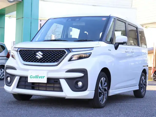 スズキ ソリオ バンディット HV MV 神奈川県 2023(令5)年 0.8万km ピュアホワイトP 純正メモリナビ/フルセグテレビ/全方位カメラ/Bluetooth/アダプティブクルーズ/スズキセーフティサポート/両側パワースライドドア/プッシュスタート/ドライブレコーダー/ETC/前関シートヒーター/LEDヘッドライト/保証書/取説/記録(R.7)/スペアスマートキー