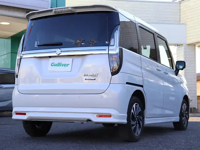 スズキ ソリオ バンディット HV MV 神奈川県 2023(令5)年 0.8万km ピュアホワイトP 純正メモリナビ/フルセグテレビ/全方位カメラ/Bluetooth/アダプティブクルーズ/スズキセーフティサポート/両側パワースライドドア/プッシュスタート/ドライブレコーダー/ETC/前関シートヒーター/LEDヘッドライト/保証書/取説/記録(R.7)/スペアスマートキー