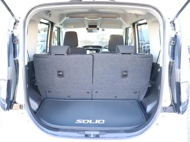 スズキ ソリオ バンディット HV MV 神奈川県 2023(令5)年 0.8万km ピュアホワイトP 純正メモリナビ/フルセグテレビ/全方位カメラ/Bluetooth/アダプティブクルーズ/スズキセーフティサポート/両側パワースライドドア/プッシュスタート/ドライブレコーダー/ETC/前関シートヒーター/LEDヘッドライト/保証書/取説/記録(R.7)/スペアスマートキー