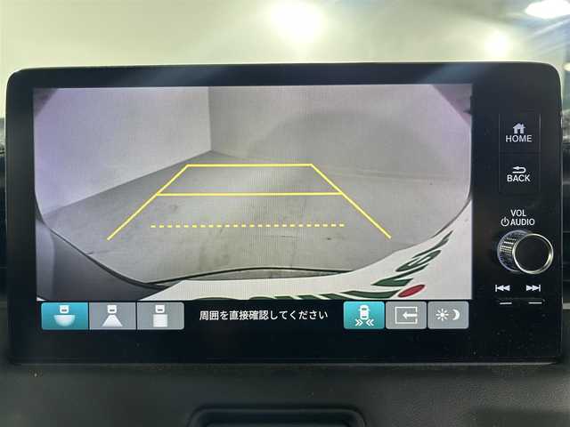 ホンダ ヴェゼル ハイブリッド e:HEV Z 佐賀県 2024(令6)年 1万km クリスタルブラックパール Honda CONNECT9インチディスプレイ/フルセグTV/ナビ対応/バックカメラ/コンビシート(プライムスムース×ファブリック)/シートヒーター/ステアリングヒーター/パワーテールゲート/純正18インチアルミホイール/ヒルディセントコントロール/Honda SENSING/衝突軽減ブレーキ（CMBS）/先行車発進お知らせ機能/歩行者事故低減ステアリング/路外逸脱抑制機能/標識認識機能/渋滞追従機能付アダプティブクルーズコントロール（ACC）/車線維持支援システム（LKAS）/トラフィックジャムアシスト（渋滞運転支援機能）/ブラインドスポットインフォメーション/誤発進抑制機能/後方誤発進抑制機能/近距離衝突軽減ブレーキ/急アクセル抑制機能/パーキングセンサーシステム/後退出庫サポート/オートハイビーム/アダプティブドライビングビーム