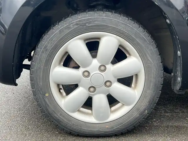 スズキ ラパン T Lパッケージ 秋田県 2012(平24)年 13.7万km ブルーイッシュブラックパール3 ４WD/純正オーディオ（AM/FM/CD)/スマートキー/純正アルミ/プッシュスタート/D席シートヒーター/純正フロアマット/純正ドアバイザー/オートエアコン/レベライザー/パワーステアリング/パワーウィンドウ/電動格納ウィンカーミラー/保証書/取扱説明書/記録簿