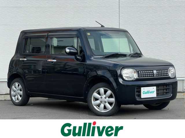 スズキ ラパン T Lパッケージ 秋田県 2012(平24)年 13.7万km ブルーイッシュブラックパール3 ４WD/純正オーディオ（AM/FM/CD)/スマートキー/純正アルミ/プッシュスタート/D席シートヒーター/純正フロアマット/純正ドアバイザー/オートエアコン/レベライザー/パワーステアリング/パワーウィンドウ/電動格納ウィンカーミラー/保証書/取扱説明書/記録簿