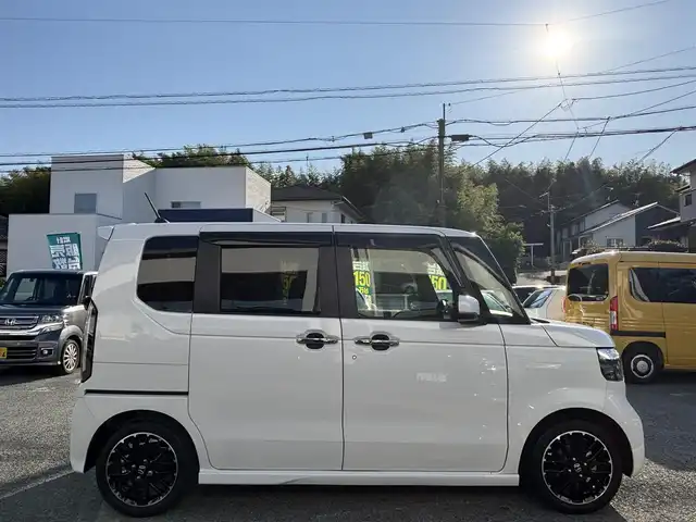 ホンダ Ｎ ＢＯＸ カスタム ターボ コーディネートS 熊本県 2024(令6)年 2.7万km プラチナホワイトパール ワンオーナー/社外10インチフローティングナビ（CN-F1X10BD）/【フルセグTV/CD/DVD/ＢＤ/Bluetooth/ラジオ】/バックカメラ/両側パワースライドドア/レーダークルーズコントロール/衝突軽減ブレーキ/先行車発進お知らせ機能/車線維持支援システム/標識認識機能/パドルシフト/横滑り防止機能/ブレーキホールド/黒革シート/前席シートヒーター/純正15インチAW/オートライト/LEDヘッドライト/ベンチシート/リヤサンシェード/ISOFIX/保証書/取扱説明書
