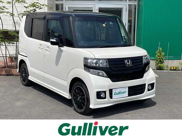 ホンダ Ｎ ＢＯＸ 2トーン カスタム G ターボAパッケージ 青森県 2014(平26)年 8.1万km プレミアムホワイトパール 4WD・ターボ/純正8インチSDナビ・フルセグTV/HDMI・BT・SD・CD・DVD/バックカメラ/両側パワースライドドア/Aパッケージ/あんしんパッケージ/シティブレーキアクティブシステム/サイドカーテンエアバッグ/クルーズコントロール/パドルシフト/前方ドライブレコーダー/社外エンジンスターター/HIDライト/フォグライト/純正15インチアルミ/スマートキー/プッシュスタート