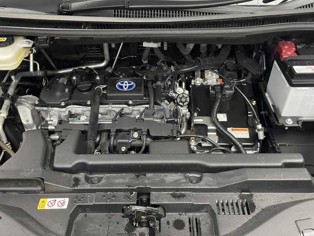 トヨタ ヴォクシー ハイブリッド S－Z 三重県 2022(令4)年 1.7万km スパークリングブラックパールクリスタルシャイン 禁煙車/純正ナビ/CD/DVD/BT/USB/フルセグTV/バックカメラ/プリクラッシュセーフティ/レーントレーシングアシスト/ロードサインアシスト/レーダークルーズコントロール/両側パワースライドドア/純正フリップダウンモニター/前席シートヒーター/ビルトインETC2.0/オートハイビーム/AC100V