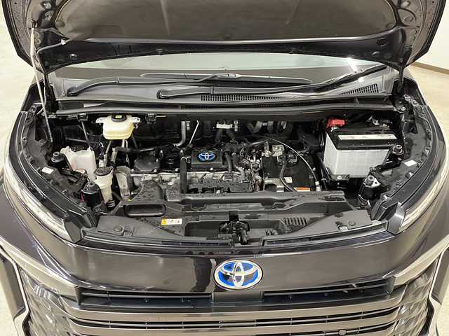 トヨタ ヴォクシー ハイブリッド S－Z 熊本県 2022(令4)年 1.7万km スパークリングブラックパールクリスタルシャイン 禁煙車/トヨタセーフティセンス/・プリクラッシュセーフティ/・レーントレーシングアシスト/・ロードサインアシスト/・オートマチックハイビーム/・レーダークルーズコントロール/8型ディスプレイオーディオ/ナビ機能/CD/DVD/BT/USB/フルセグTV/両側パワースライドドア/バックカメラ/純正フリップダウンモニター/ハーフレザー/前席シートヒーター/ビルトインETC2.0/LEDヘッドライト/AC100V/純正ドアバイザー