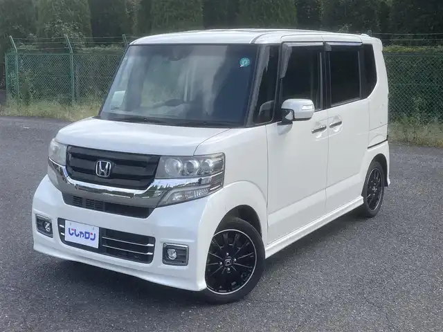 ホンダ Ｎ ＢＯＸ カスタム ターボ SSブラックSパッケージ 埼玉県 2017(平29)年 11.7万km プレミアムホワイトパールⅡ (株)IDOMが運営する【じしゃロン鳩ヶ谷店】の自社ローン専用車両になりますこちらは現金またはオートローンご利用時の価格です。自社ローンご希望の方は別途その旨お申付け下さい/ターボ車/社外メモリーナビ(品番:MDV-L404)/社外ワンセグTV/アイドリングストップ/クルーズコントロール/パドルシフト/革巻ステアリング/プッシュスタート/両側パワースライドドア/ETC/前方ドライブレコーダー/純正15インチAW/衝突被害軽減システム/ハーフレザーシート/前席シートヒーター/スマートキー/スペアキー1本/ウインカーミラー/フォグランプ