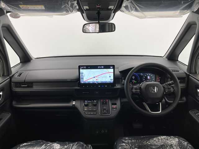 ホンダ ステップワゴン スパーダ eHEV 長野県 2025(令7)年 0.1千km クリスタルブラックパール 届出済未使用車/純正メモリナビ&フルセグTV&CD&DVD&USB&BT/ホンダセンシング/アダプティブクルーズコントロール/レーンキープアシスト/衝突軽減ブレーキ/ブラインドスポットインフォメーション/クリアランスソナー/標識認識表示/両側パワースライドドア/パワーバックドア/ハーフレザーシート/前席シートヒーター/ステアリングスイッチ/パドルシフト/2列目オットマン/2列目サンシェード/バックカメラ/LEDヘッドライト/オートライト/フロントフォグランプ/電動格納ミラー/ウィンカーミラー/電動ホールド/ブレーキホールド/純正16インチAW装着/プッシュスタート/スマートキー/スペアキー1本/取扱説明書/新車保証書