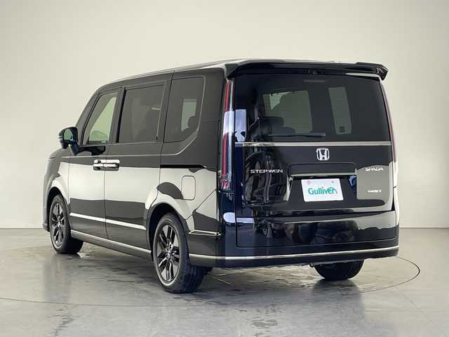 ホンダ ステップワゴン スパーダ eHEV 長野県 2025(令7)年 0.1千km クリスタルブラックパール 届出済未使用車/純正メモリナビ&フルセグTV&CD&DVD&USB&BT/ホンダセンシング/アダプティブクルーズコントロール/レーンキープアシスト/衝突軽減ブレーキ/ブラインドスポットインフォメーション/クリアランスソナー/標識認識表示/両側パワースライドドア/パワーバックドア/ハーフレザーシート/前席シートヒーター/ステアリングスイッチ/パドルシフト/2列目オットマン/2列目サンシェード/バックカメラ/LEDヘッドライト/オートライト/フロントフォグランプ/電動格納ミラー/ウィンカーミラー/電動ホールド/ブレーキホールド/純正16インチAW装着/プッシュスタート/スマートキー/スペアキー1本/取扱説明書/新車保証書