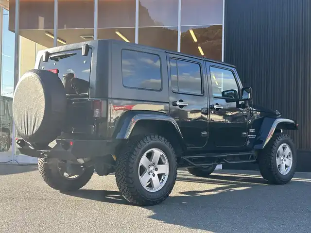 クライスラー・ジープ ジープ ラングラー アンリミテッド スポーツ4AT 福岡県 2010(平22)年 12.1万km 黒 All-Terrainタイヤ/社外オーディオ/ATOTO/Bluetooth/XRC/TERAFLEX/リフトアップ/Bカメラ/サイドカメラ/ETC/純正フロアマット/純正18インチAW/社外LEDライト/保証書/取扱説明書/リモコンキー