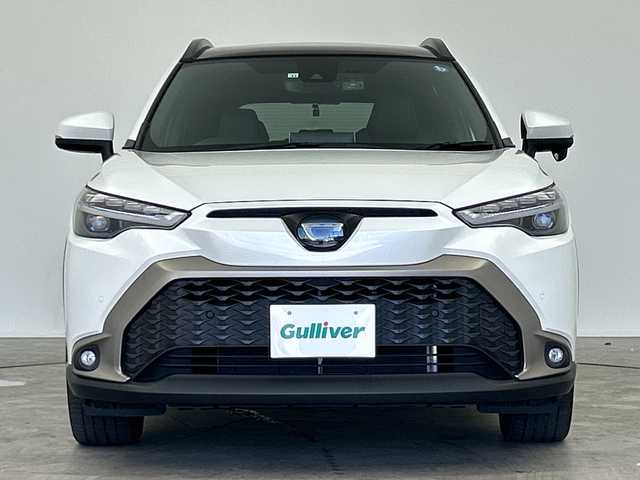 トヨタ カローラ クロス ハイブリッド Z 三重県 2022(令4)年 3.5万km プラチナホワイトパールマイカ /禁煙車//純正9インチディスプレイオーディオ//純正OP DVDデッキ//バックカメラ//オートAC//DN席シートヒーター//D席パワーシート//ハーフレザーシート//電子サイドブレーキ//ブレーキオートホールド//パノラマルーフ//100V充電//4WD//トヨタセーフティセンス//PCS//LTA//PKSB//RSA//前後クリアランスソナー//革巻きステアリング//ステアリングスイッチ//レーダークルーズコントロール//オートハイビーム//純正ビルトインETC2.0//社外前後ドライブレコーダー//LED//フォグ