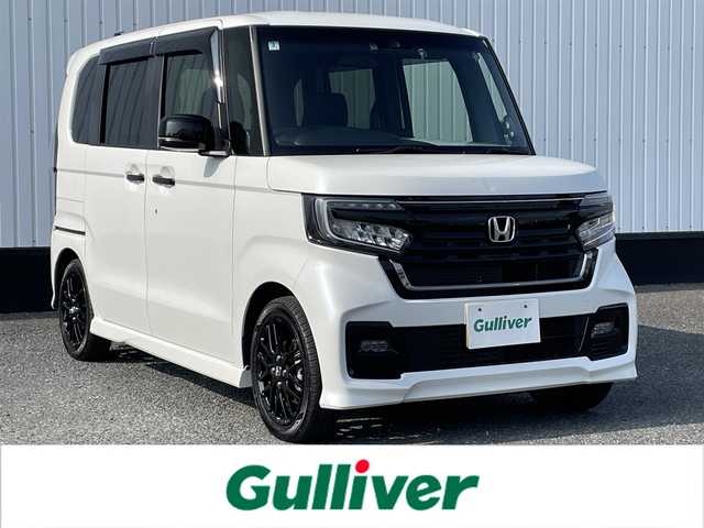 ホンダ Ｎ ＢＯＸ カスタム L ターボ スタイル+ブラック 千葉県 2022(令4)年 1.5万km プラチナホワイトパール 大型ルーフコンソール/衝突被害軽減システム/車線逸脱警報/クルーズコントロール/ハーフレザーシート/両側パワースライドドア/横滑り防止装置/ETC/アイドリングストップ/LEDヘッドライト/フォグランプ/オートライト/ウィンカーミラー/電動格納ミラー/純正15インチAW/シートヒーター/シートリフター/電子制御パーキング/ブレーキホールド/プッシュスタート/スマートキー/フロアマット/ドアバイザー/スペアキー/取扱説明書/保証書