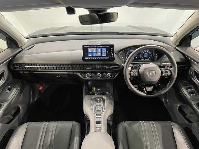 ホンダ ＺＲ－Ｖ ハイブリッド e:HEV Z 愛知県 2024(令6)年 1.1万km ミッドナイトブルービームM 純正９インチディスプレイナビ　/（FM/AM/USB/Bluetooth/スマホ連載/フルセグTV)/純正エアロ（Ｆ／Ｓ）/マルチビューカメラシステム　/ホンダセンシング　/　　-衝突軽減ブレーキ/　　-誤発進抑制機能/　　-アダプティブクルーズコントロール/　　-車線維持支援システム/　　-先行車発進お知らせ機能/　　-標識認識機能/　　-オートハイビーム/　　-ブラインドスポットインフォメーション/ビルトインＥＴＣ２．０　/シートヒーター　/LEDヘッドライト/LEDフォグランプ/ワイヤレス充電　/電動バックドア　/ドライブレコーダー　/メモリー機能付きパワーシート　/ステアリングヒーター/パドルシフト/純正フロアマット