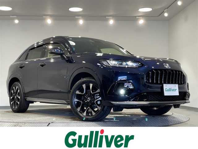 ホンダ ＺＲ－Ｖ ハイブリッド e:HEV Z 愛知県 2024(令6)年 1.1万km ミッドナイトブルービームM 純正９インチディスプレイナビ　/（FM/AM/USB/Bluetooth/スマホ連載/フルセグTV)/純正エアロ（Ｆ／Ｓ）/マルチビューカメラシステム　/ホンダセンシング　/　　-衝突軽減ブレーキ/　　-誤発進抑制機能/　　-アダプティブクルーズコントロール/　　-車線維持支援システム/　　-先行車発進お知らせ機能/　　-標識認識機能/　　-オートハイビーム/　　-ブラインドスポットインフォメーション/ビルトインＥＴＣ２．０　/シートヒーター　/LEDヘッドライト/LEDフォグランプ/ワイヤレス充電　/電動バックドア　/ドライブレコーダー　/メモリー機能付きパワーシート　/ステアリングヒーター/パドルシフト/純正フロアマット