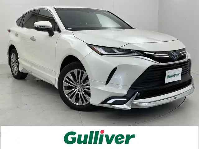 トヨタ ハリアー ハイブリッド Z レザーパッケージ 茨城県 2020(令2)年 2万km ホワイトパールクリスタルシャイン 純正12.3型DAナビ/全周囲カメラ/フルセグ/モデリスタエアロ/ワイヤレス充電/AC100V/デジタルインナーミラー/衝突被害軽減ブレーキ/車線逸脱抑制装置/レーダークルーズコントロール/オートマチックハイビーム/クリアランスソナー/BSM/ETC2.0/パワーバックドア/シートヒーター/ベンチレーション/ステアリングヒーター/黒革シート/純正19インチAW/LEDヘッドライト/スマートキー