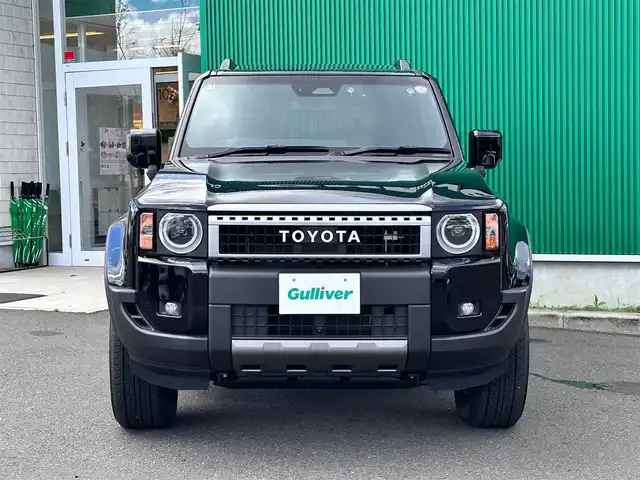 トヨタ ランドクルーザー ２５０ VX 宮城県 2025(令7)年 0.2万km ブラック 丸目1眼LEDヘッドライト/ルーフレール/寒冷地仕様/ワンオーナー/純正12.3インチディスプレイオーディオナビ/・フルセグ/・HDMI入力/・パイオニアプレミアムサウンドシステム/・AppleCarPlay/ＡｎｄｒｏｉｄＡuto/・ＡＭ/FMチューナー/・ＵＳＢ入力/パノラマミックビューモニター/セーフティセンス/・プリクラッシュセーフティ/・レーダークルーズコントロール/・レーンディパーチャーアラート/・オートマチックハイビーム/・ドライバー異常検知対応システム/・プロアクティブドライビングアシスト/・発進遅れ告知機能/・レーントレーシングアシスト/・ロードサインアシスト/デジタルインナーミラー/ドライブレコーダー/黒革シート【ベンチレーション】/パワーシート/スペアタイヤ/トノカバー/保証書