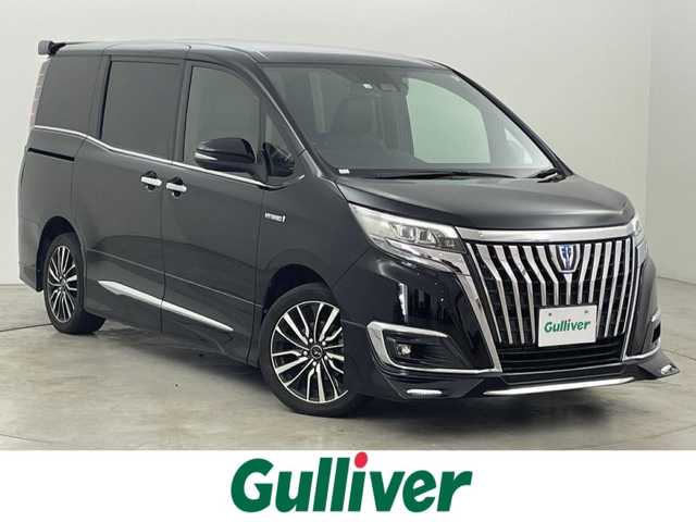 トヨタ エスクァイア ハイブリッド Gi プレミアムパッケージ 福岡県 2018(平30)年 4.6万km ブラック モデリスタエアロ　/アルパインビッグＸ１１ナビ/フルセグTV　/バックカメラ　/ビルトインETC　/前方ドライブレコーダー　/クルーズコントロール　/衝突軽減ブレーキ　/レーンキープ　/オートマチックハイビーム　/両側電動スライドドア　/ハーフレザーシート　/ステアリングヒーター　/シートヒーター　/ＬＥＤヘッドライト　/レオンス１７インチＡＷ