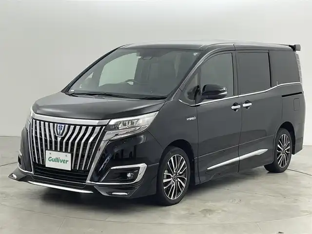 トヨタ エスクァイア ハイブリッド Gi プレミアムパッケージ 福岡県 2018(平30)年 4.6万km ブラック モデリスタエアロ　/アルパインビッグＸ１１ナビ/フルセグTV　/バックカメラ　/ビルトインETC　/前方ドライブレコーダー　/クルーズコントロール　/衝突軽減ブレーキ　/レーンキープ　/オートマチックハイビーム　/両側電動スライドドア　/ハーフレザーシート　/ステアリングヒーター　/シートヒーター　/ＬＥＤヘッドライト　/レオンス１７インチＡＷ