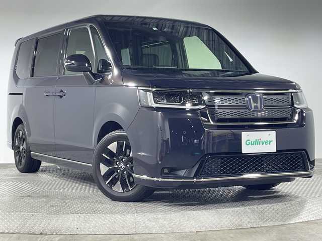 ホンダ ステップワゴン スパーダ eHEV 神奈川県 2022(令4)年 2万km プレミアムディープバイオレットパール 純正11.4型メモリーナビゲーション【LXM-２３７VFLi】/フルセグTV　CD DVD　Bluetooth　SD　MUSICRACK/バックカメラ/純正15.6型フリップダウンモニター/両側電動スライドドア【サンシェード】/パワーバックドア/ホンダセンシング/衝突軽減ブレーキ/後方誤発進抑制機能/歩行者事故低減ステアリング/渋滞追従機能付アダブティブクルーズコントロール/誤発進抑制機能/近距離衝突軽減ブレーキ/路外逸脱抑制機能/車線維持支援システム/トラフィックジャムアシスト/先行車発進お知らせ/標識認識機能/オートハイビーム/ブラインドスポットインフォメーション/アダブティブドライビングビーム/フロントリアソナー/革巻きステアリング/パドルシフト/ハーフレザーシート/前席シートヒーター/2列目オットマン/電動パーキングブレーキ/ブレーキオートホールド/プッシュスタート/スマートキー/純正リアスポイラー/LEDヘッドランプ/LEDアクティブコーナリングランプ/LEDフロントフォグランプ/純正16インチアルミホイール
