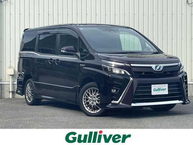 トヨタ ヴォクシー ハイブリッド ZS 山形県 2017(平29)年 8.8万km ボルドーマイカメタリック 衝突軽減/フリップダウンモニター/純正SDナビ/　　【CD　BT　フルセグ　USB 】/バックカメラ/両側パワースライドドア/クルーズコントロール/LEDオートライト/オートハイビーム/シートヒーター/純正16インチアルミホイール/レーンキープアシスト/純正フロアマット/ステアリングスイッチ/スマートキー/ETC