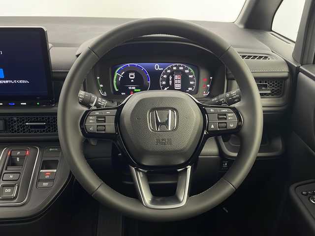 ホンダ ステップワゴン スパーダ eHEV 栃木県 2025(令7)年 0.1千km クリスタルブラックパール 登録済未使用車/純正11.4型ナビ/（CD/DVD/Bluetooth/フルセグ）/バックカメラ/Honda CONNECT for Gathers＋ナビ装着用スペシャルパッケージ/Honda SENSING/●衝突軽減ブレーキ（CMBS）/●先行車発進お知らせ機能/●歩行者事故低減ステアリング/●路外逸脱抑制機能/●標識認識機能/●渋滞追従機能付アダプティブクルーズコントロール（ACC）/●車線維持支援システム（LKAS）/●トラフィックジャムアシスト（渋滞運転支援機能）/●誤発進抑制機能/●後方誤発進抑制機能/●近距離衝突軽減ブレーキ/●急アクセル抑制機能/●パーキングセンサーシステム/●後退出庫サポート/ブラインドスポットインフォメーション/パワーテールゲート(メモリー機能付)/2列目オットマン/運転席＆助手席シートヒーター/トリプルゾーンコントロール・フルオートエアコンディショナー/コンビシート/16インチアルミホイール(SPADA専用)/減速セレクター/全列USBチャージャー