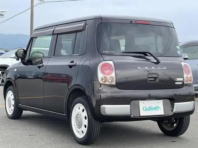 スズキ ラパン ショコラ G 佐賀県 2015(平27)年 1万km アーバンブラウンパールメタリック 社外SDナビゲーション/・ワンセグTV/AM/FM/CD/アイドリングストップ/ブラウンレザーシート(合皮)/ISOFIX対応/プッシュスタート/スマートキー/革巻きステアリング/純正キセノンヘッドライト/ドアバイザ―/取扱説明書/スペアキー１本