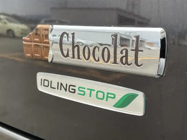 スズキ ラパン ショコラ G 佐賀県 2015(平27)年 1万km アーバンブラウンパールメタリック 社外SDナビゲーション/・ワンセグTV/AM/FM/CD/アイドリングストップ/ブラウンレザーシート(合皮)/ISOFIX対応/プッシュスタート/スマートキー/革巻きステアリング/純正キセノンヘッドライト/ドアバイザ―/取扱説明書/スペアキー１本