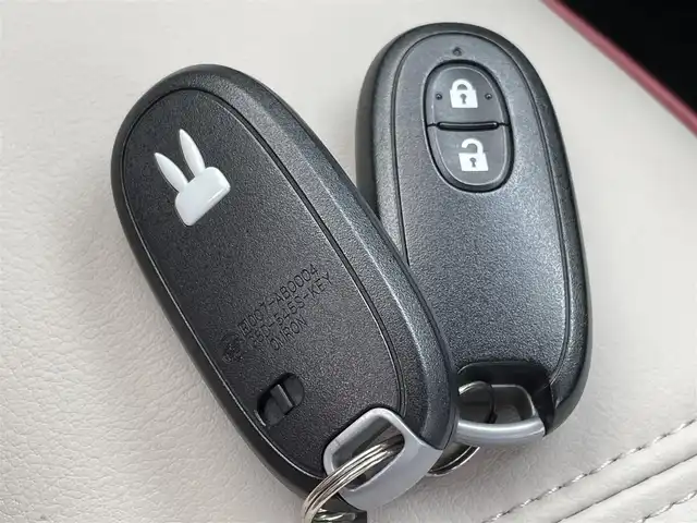 スズキ ラパン ショコラ G 佐賀県 2015(平27)年 1万km アーバンブラウンパールメタリック 社外SDナビゲーション/・ワンセグTV/AM/FM/CD/アイドリングストップ/ブラウンレザーシート(合皮)/ISOFIX対応/プッシュスタート/スマートキー/革巻きステアリング/純正キセノンヘッドライト/ドアバイザ―/取扱説明書/スペアキー１本