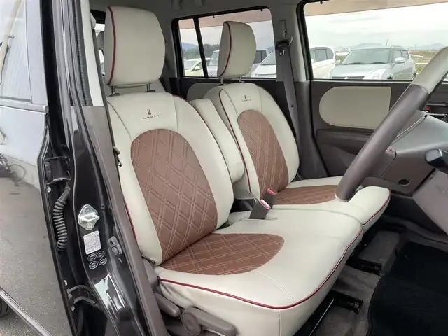 スズキ ラパン ショコラ G 佐賀県 2015(平27)年 1万km アーバンブラウンパールメタリック 社外SDナビゲーション/・ワンセグTV/AM/FM/CD/アイドリングストップ/ブラウンレザーシート(合皮)/ISOFIX対応/プッシュスタート/スマートキー/革巻きステアリング/純正キセノンヘッドライト/ドアバイザ―/取扱説明書/スペアキー１本