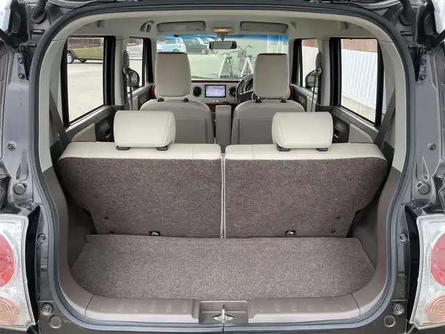 スズキ ラパン ショコラ G 佐賀県 2015(平27)年 1万km アーバンブラウンパールメタリック 社外SDナビゲーション/・ワンセグTV/AM/FM/CD/アイドリングストップ/ブラウンレザーシート(合皮)/ISOFIX対応/プッシュスタート/スマートキー/革巻きステアリング/純正キセノンヘッドライト/ドアバイザ―/取扱説明書/スペアキー１本