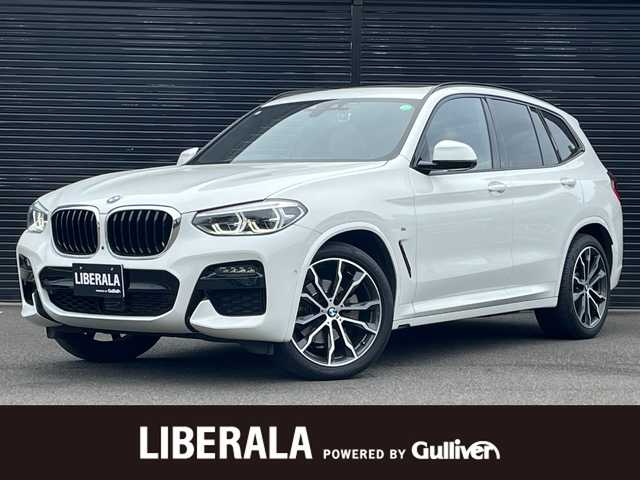 ＢＭＷ Ｘ３ xDrive20d Mスポーツ 静岡県 2020(令2)年 4.2万km アルピンホワイトⅢ ワンオーナー/ハイラインパッケージ/・ランバーサポート/・リヤシートヒーティング/・ヴァーネスカレザーシート/・ポプラグレーファインウッドインテリアトリム／パールクロームハイライト/電動パノラマガラスサンルーフ/アンビエントライト/M ライトアロイホイールダブルスポークスタイリング699M/BMWヘッドアップディスプレイ/ブラインドスポットアシスト/BMWライブコックピット/・12.3インチ マルチディスプレイメーターパネル/・10.25インチワイドコントロールディスプレイ/・HDDナビゲーションシステム/パーキングアシストプラス/・PDC/・パーキングアシスト/・トップビュー/・サイドビューカメラ/・リヤビューカメラ/ドライビングアシストプラス/・ACC/・ステアリング&レーンコントロールアシスト/・レーンディパーチャーウォーニング/・レーンチェンジウォーニング/・アクティブサイドコリジョンプロテクション/・前車接近警告機能/・衝突回避・被害軽減ブレーキ/・事故回避アシスト/・後車衝突警告機能/・クロストラフィックウォーニング/メモリー付パワーシート