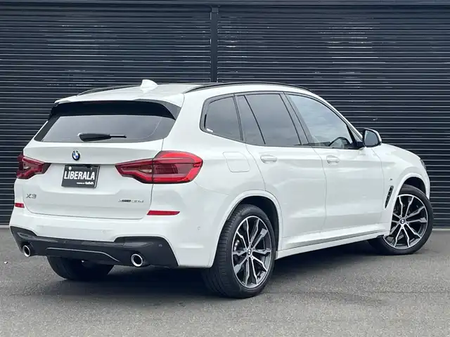 ＢＭＷ Ｘ３ xDrive20d Mスポーツ 静岡県 2020(令2)年 4.2万km アルピンホワイトⅢ ワンオーナー/ハイラインパッケージ/・ランバーサポート/・リヤシートヒーティング/・ヴァーネスカレザーシート/・ポプラグレーファインウッドインテリアトリム／パールクロームハイライト/電動パノラマガラスサンルーフ/アンビエントライト/M ライトアロイホイールダブルスポークスタイリング699M/BMWヘッドアップディスプレイ/ブラインドスポットアシスト/BMWライブコックピット/・12.3インチ マルチディスプレイメーターパネル/・10.25インチワイドコントロールディスプレイ/・HDDナビゲーションシステム/パーキングアシストプラス/・PDC/・パーキングアシスト/・トップビュー/・サイドビューカメラ/・リヤビューカメラ/ドライビングアシストプラス/・ACC/・ステアリング&レーンコントロールアシスト/・レーンディパーチャーウォーニング/・レーンチェンジウォーニング/・アクティブサイドコリジョンプロテクション/・前車接近警告機能/・衝突回避・被害軽減ブレーキ/・事故回避アシスト/・後車衝突警告機能/・クロストラフィックウォーニング/メモリー付パワーシート