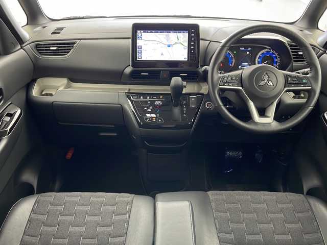 三菱 デリカミニ T プレミアム 宮城県 2023(令5)年 0.8万km オレンジ ４ＷＤ　/純正９インチナビ(AM/FM/BT/フルセグTV)/全方位モニター　/両側パワースライドドア　/デジタルインナーミラー/IC付ターボ　/ｅ－Ａｓｓｉｓｔ　/　・レーダークルーズコントロール　/　・車線維持支援機能　/　・衝突被害軽減ブレーキシステム/　・踏み間違い衝突防止アシスト/　・標識認識システム/　・先行車発進通知/　・ふらつき警報/　・横滑り防止装置/　・ヒルスタートアシスト/　・オートマチックハイビーム/オートライト/LEDライト/ヘッドライトレベライザー/フォグランプ/電動パーキングブレーキ/前後コーナーセンサー/純正アルミホイール/サイドバイザー/ステアリングスイッチ/レザーステアリング/ハーフレザーシート/プッシュスタート/スマートキー