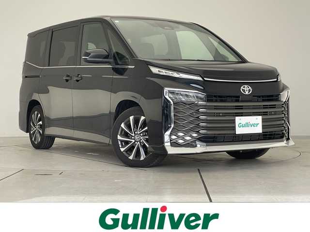 トヨタ ヴォクシー S－Z 愛知県 2023(令5)年 2.1万km アティチュードブラックマイカ 衝突軽減システム/純正10.5型ディズプレイオーディオ　ナビあり/フリップダウンモニター/全方位カメラ/両側パワースライドドア/シートヒーター/フルセグ/CD DVD/Bluetooth/バックカメラ/コーナーセンサー/ETC2.0/LEDヘッドライト/リアオートエアコン/ドライブレコーダー/ステアリングスイッチ/スマートキー/プッシュスタート