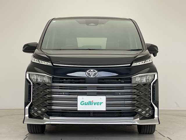 トヨタ ヴォクシー S－Z 愛知県 2023(令5)年 2.1万km アティチュードブラックマイカ 衝突軽減システム/純正10.5型ディズプレイオーディオ　ナビあり/フリップダウンモニター/全方位カメラ/両側パワースライドドア/シートヒーター/フルセグ/CD DVD/Bluetooth/バックカメラ/コーナーセンサー/ETC2.0/LEDヘッドライト/リアオートエアコン/ドライブレコーダー/ステアリングスイッチ/スマートキー/プッシュスタート