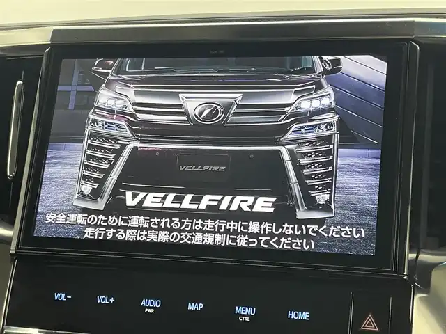 トヨタ ヴェルファイア Z Gエディション 岡山県 2019(平31)年 6万km ホワイトパールクリスタルシャイン 純正１０インチナビ/【Bluetooth/フルセグTV/CD/DVD】/合皮シート/衝突軽減ブレーキ/両側電動スライドドア/レーダークルーズコントロール/ビルトインＥＴＣ/ＬＥＤヘッドライト/前席シートヒーター/前席エアシート/ステアリングヒーター/バックカメラ/社外ドライブレコーダー（前後）/ブラインドスポットモニター/純正フロアマット/踏み間違い防止/レーンアシスト/横滑り防止/オートブレーキホールド/TVキャンセラー/ISOFIX/後席サンシェイド/ステアリングスイッチ/チルトステアリング/シートリフター/ウインカーミラー/ドアバイザー