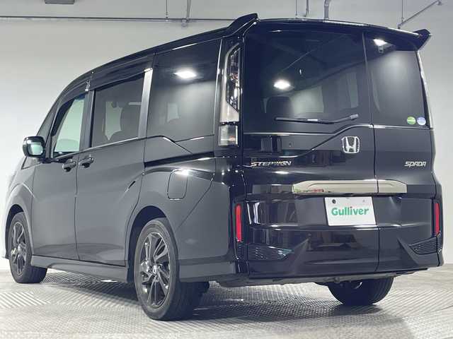 ホンダ ステップワゴン スパーダクールスピリット HセンシングBスタイル 神奈川県 2020(令2)年 6.2万km プレミアムスパークルブラックパール ブラックスタイル/純正10型メモリーナビゲーション【VXU-207SWi】/フルセグ　CD　DVD　Bluetooth SDMUSICRACK　iPod　AM FM /バックカメラ/純正後席フリップダウンモニター【VM-185EN】/両側電動スライドドア【サンセード】/わくわくゲート/ホンダセンシング/衝突軽減ブレーキ/誤発進抑制機能/歩行者事故低減ステアリング/路外逸脱抑制機能/渋滞追従機能付きアダブティブクルーズコントロール/LKAS車線維持支援システム/先行車発進お知らせ機能/標識認識機能/アイドリングストップ/革巻きステアリング/パドルシフト/シルバーアクセント付ブラックソフトウエーブ/プライムスムース【合皮】コンビシート/前席シートヒーター/前後ドライブレコーダー/プラズマクラスター付トリプルゾーン【運転席/助手席/後席】オートエアコン/スポーツペダル/超高機能付LED式マップランプ/ビルトインETC/プッシュスタート/スマートキー/LEDヘッドランプ/LEDフロントフォグランプ/オートライト/純正サイド/リアスポイラー/純正17インチアルミホイール/