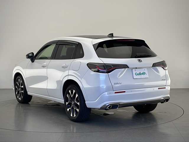 ホンダ ＺＲ－Ｖ ハイブリッド e:HEV Z 長野県 2023(令5)年 1.9万km プラチナホワイトパール 4WD/BOSEプレミアムサウンド/純正メモリナビ&フルセグTV&USB&BT/ホンダセンシング/アダプティブクルーズコントロール/路外逸脱警報/衝突軽減ブレーキ/踏み間違い防止/ブラインドスポットインフォメーション/社外前後ドライブレコーダー/パワーバックドア/レザーシート/前席シートヒーター/前席パワーシート/運転席シートメモリ/ステアリングスイッチ/ステアリングヒーター/パドルシフト/全方位カメラ/ビルトインETC2.0/LEDヘッドライト/オートライト/電動格納ミラー/ウィンカーミラー/ドアミラーヒーター/電動ホールド/ブレーキホールド/純正18インチAW装着/純正フロアマット/社外ドアバイザー/プッシュスタート/スマートキー