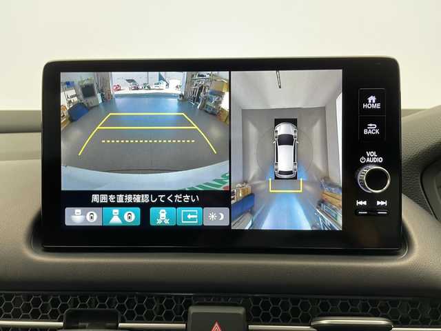 ホンダ ＺＲ－Ｖ ハイブリッド e:HEV Z 長野県 2023(令5)年 1.9万km プラチナホワイトパール 4WD/BOSEプレミアムサウンド/純正メモリナビ&フルセグTV&USB&BT/ホンダセンシング/アダプティブクルーズコントロール/路外逸脱警報/衝突軽減ブレーキ/踏み間違い防止/ブラインドスポットインフォメーション/社外前後ドライブレコーダー/パワーバックドア/レザーシート/前席シートヒーター/前席パワーシート/運転席シートメモリ/ステアリングスイッチ/ステアリングヒーター/パドルシフト/全方位カメラ/ビルトインETC2.0/LEDヘッドライト/オートライト/電動格納ミラー/ウィンカーミラー/ドアミラーヒーター/電動ホールド/ブレーキホールド/純正18インチAW装着/純正フロアマット/社外ドアバイザー/プッシュスタート/スマートキー
