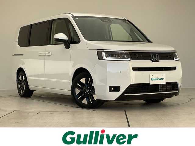 ホンダ ステップワゴン eHEV エアー 大阪府 2024(令6)年 1.9万km プラチナホワイトパール ホンダセンシング/純正11型ナビ/バックカメラ/両側パワースライドドア/レーダークルーズコントロール/CD DVD/Bluetooth/フルセグ/コーナーセンサー/純正アルミホイール/ETC/LEDヘッドライト/レーンキープアシスト/ドライブレコーダー/スマートキー/プッシュスタート