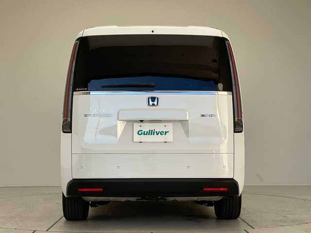 ホンダ ステップワゴン eHEV エアー 大阪府 2024(令6)年 1.9万km プラチナホワイトパール ホンダセンシング/純正11型ナビ/バックカメラ/両側パワースライドドア/レーダークルーズコントロール/CD DVD/Bluetooth/フルセグ/コーナーセンサー/純正アルミホイール/ETC/LEDヘッドライト/レーンキープアシスト/ドライブレコーダー/スマートキー/プッシュスタート