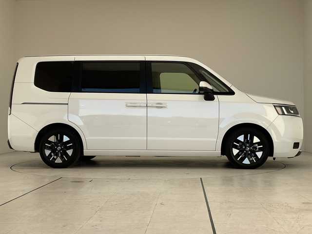 ホンダ ステップワゴン eHEV エアー 大阪府 2024(令6)年 1.9万km プラチナホワイトパール ホンダセンシング/純正11型ナビ/バックカメラ/両側パワースライドドア/レーダークルーズコントロール/CD DVD/Bluetooth/フルセグ/コーナーセンサー/純正アルミホイール/ETC/LEDヘッドライト/レーンキープアシスト/ドライブレコーダー/スマートキー/プッシュスタート