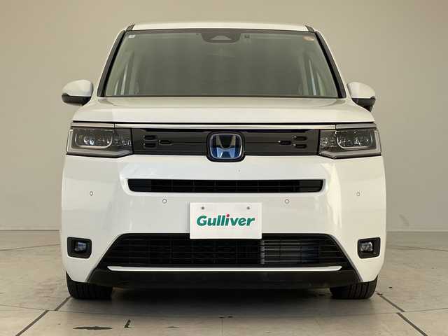 ホンダ ステップワゴン eHEV エアー 大阪府 2024(令6)年 1.9万km プラチナホワイトパール ホンダセンシング/純正11型ナビ/バックカメラ/両側パワースライドドア/レーダークルーズコントロール/CD DVD/Bluetooth/フルセグ/コーナーセンサー/純正アルミホイール/ETC/LEDヘッドライト/レーンキープアシスト/ドライブレコーダー/スマートキー/プッシュスタート