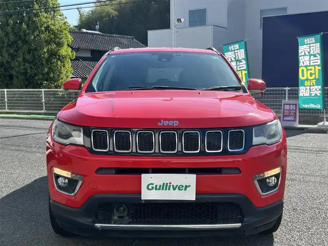 クライスラー・ジープ ジープ コンパス リミテッド 熊本県 2018(平30)年 5.6万km 赤 Beatsサウンド/4WD/純正メモリナビ/【ワンセグTV/CD/DVD/USB/Bluetooth】/バックカメラ/パーキングアシスト/レーダークルーズコントロール/レーンキープアシスト/コーナーセンサー/本革シート/パワーシート(D席)/前席シートヒーター/純正18インチアルミホイール/オートライト/オートマチックハイビーム/ダブル＋サイドエアバック/純正フロアマット/ビルトインETC/ドライブレコーダー/横滑り防止装置/盗難防止装置