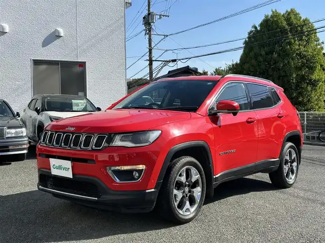 クライスラー・ジープ ジープ コンパス リミテッド 熊本県 2018(平30)年 5.6万km 赤 Beatsサウンド/4WD/純正メモリナビ/【ワンセグTV/CD/DVD/USB/Bluetooth】/バックカメラ/パーキングアシスト/レーダークルーズコントロール/レーンキープアシスト/コーナーセンサー/本革シート/パワーシート(D席)/前席シートヒーター/純正18インチアルミホイール/オートライト/オートマチックハイビーム/ダブル＋サイドエアバック/純正フロアマット/ビルトインETC/ドライブレコーダー/横滑り防止装置/盗難防止装置
